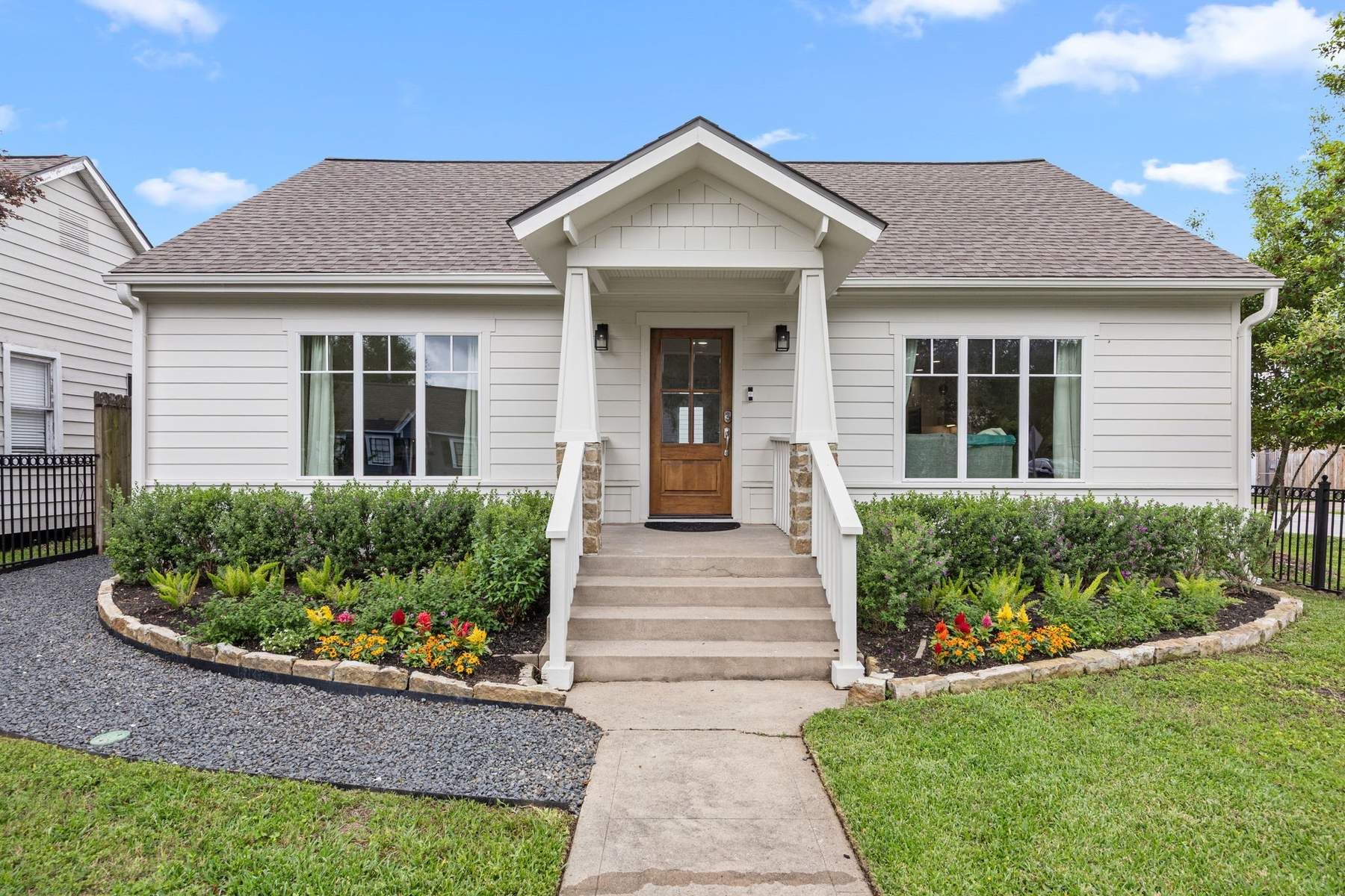 Finished front exterior of the renovated 1930s Houston Heights bungalow
